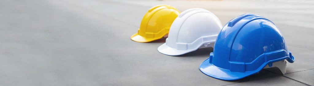 This image has an empty alt attribute; its file name is Construction-Worker-Helmets-1024x281.jpg